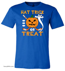A royal blue short-sleeve crewneck t-shirt featuring a Halloween graphic on the chest with the text 'HAT TRICK OR TREAT' in orange, a jack-o'-lantern, a white ghost, and crossed hockey sticks.