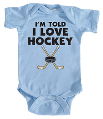 i'm told i love hockey infant bodysuit light blue