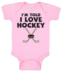 i'm told i love hockey infant bodysuit pink