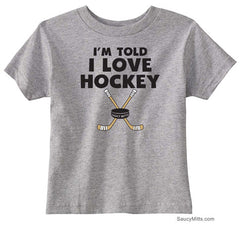 I'm Told I Love Hockey Toddler Shirt heather gray
