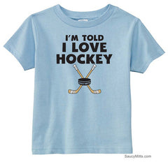 I'm Told I Love Hockey Toddler Shirt light blue